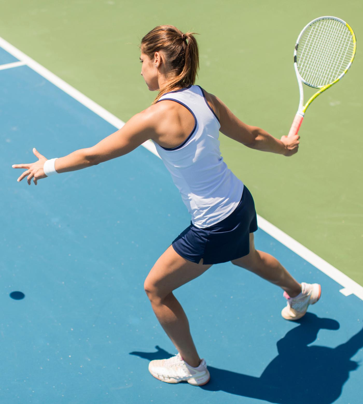 A woman playing tennis.